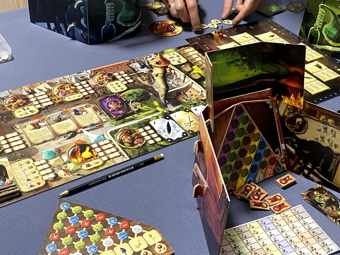 Our Alchemists game: the main board, a lab screen with the potion grid and the ingredient triangle