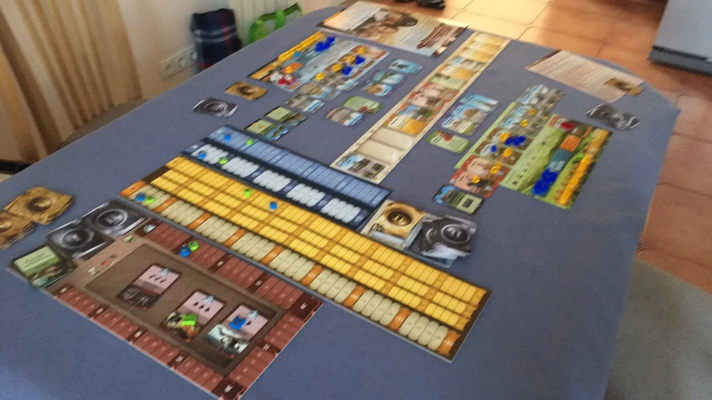 The full Through the Ages table: card rows and player boards
